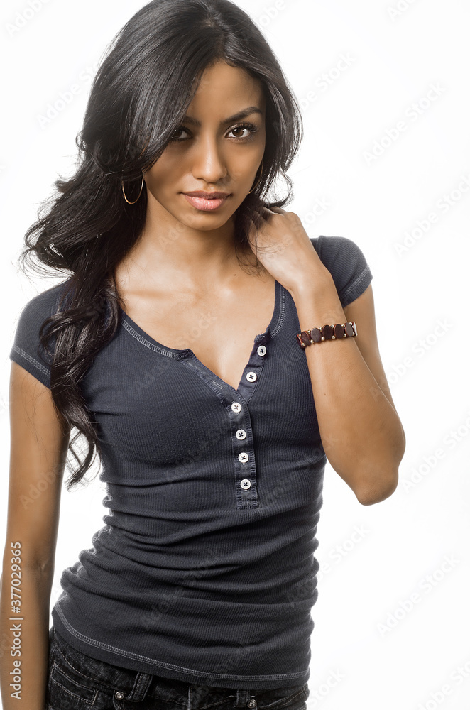Attractive young woman isolated against white background. Attractive young woman isolated against white background.