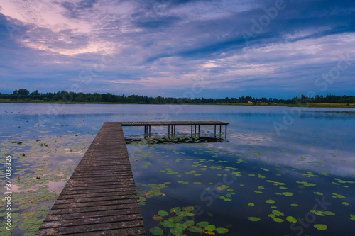 Fototapeta Naklejka Na Ścianę i Meble -  A very beautiful evening on a reserved lake in the Pskov region. Russia