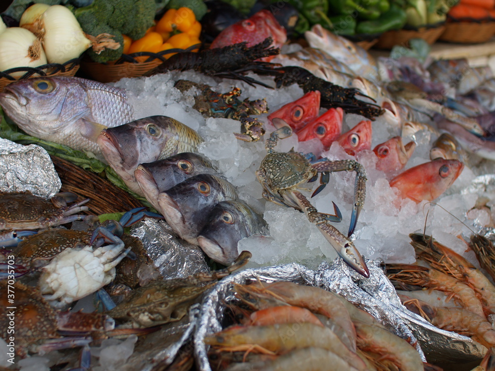 Seafood spread, Fresh selection of fish crab, prawns and vegetables. Seafood spread, Fresh selection of fish crab, prawns and vegetables.