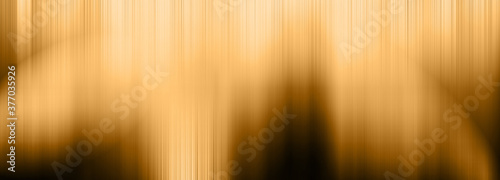An abstract blurry warm tone background image.