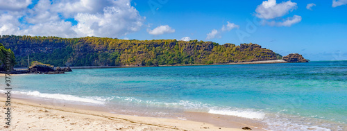 Panoramic view of the beach in the morning in the west of the republic of Mauritius.