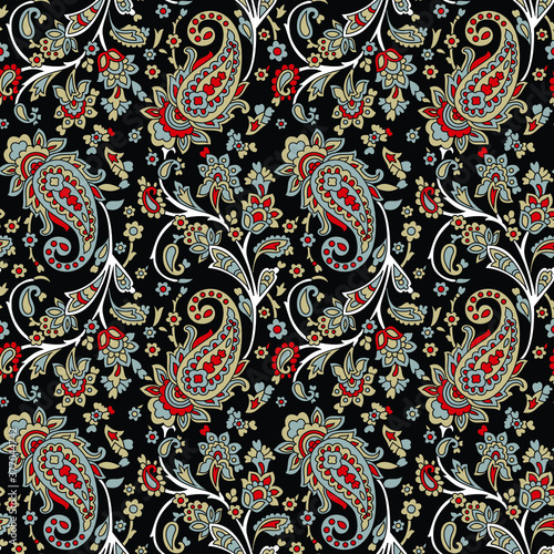 traditional Indian paisley pattern on black  background