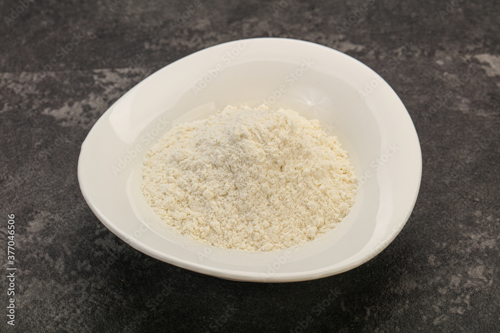 Wheat flour heap in the bowl Wheat flour heap in the bowl