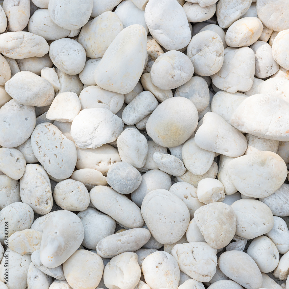 Naklejka White pebble on the small zen garden ground. Decoration material for garden