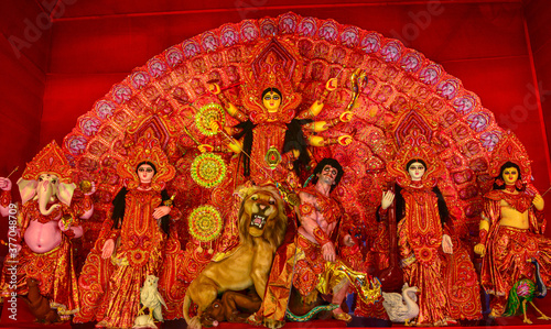 Durga Puja or Durgotsava,is an annual Hindu festival celebrated mainly in West Bengal,India.Durga is Goddess riding a lion with many arms each carrying weapons and defeating evil power of Mahishasura.