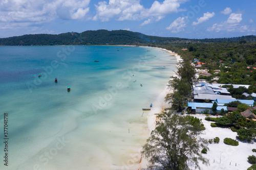 Long Beach on Koh Rong Samloem island in Cambodia, South-East Asia. top view, aerial view of a beautiful tropical island in Gulf of Thailand. With copy space texture for holiday design background.