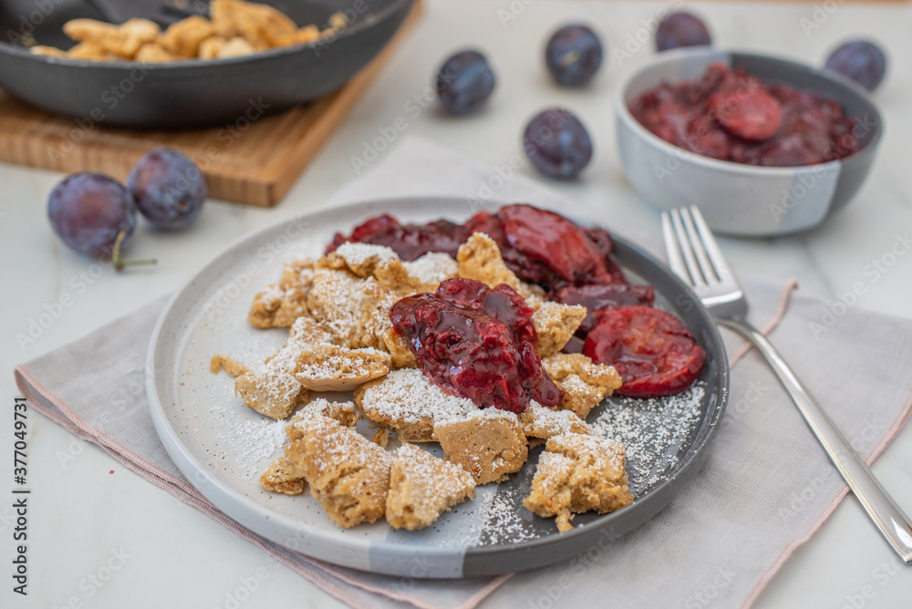 Kaiserschmarrn is a traditional Austrian or German sweet pancake dessert Kaiserschmarrn is a traditional Austrian or German sweet pancake dessert