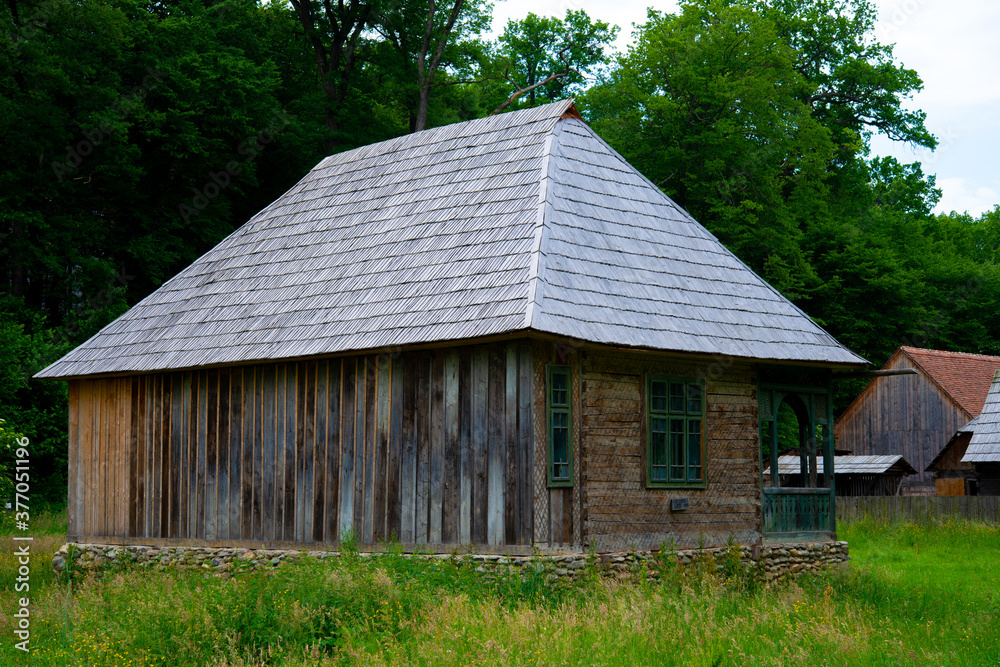 peasant house in the traditional village with thatched roof and tile peasant house in the traditional village with thatched roof and tile