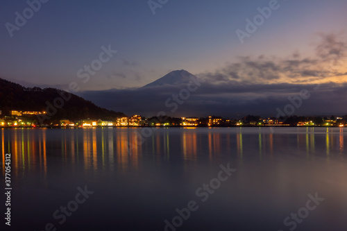 Beautiful natural landscape view of Mount Fuji at Kawaguchiko during twilight time  in autumn season at Japan. Mount Fuji is a Special Place of Scenic Beauty and one of Japan's Historic Sites.