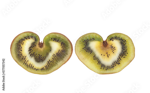 Kiwi fruit in the shape of a heart on a white background