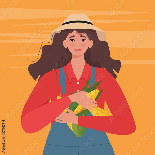 Woman farmer with corn in hand. Vector illustration in flat style