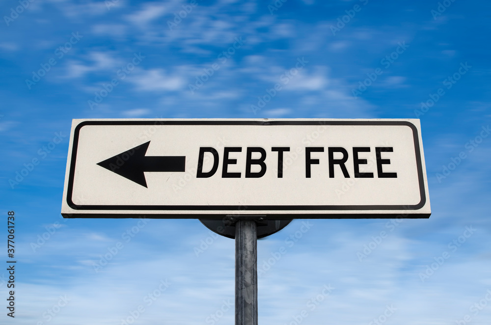 Debt free road sign, arrow on blue sky background. One way blank road sign with copy space. Arrow on a pole pointing in one direction. Debt free road sign, arrow on blue sky background. One way blank road sign with copy space. Arrow on a pole pointing in one direction.