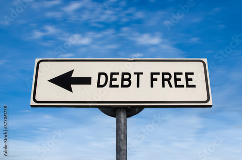 Debt free road sign, arrow on blue sky background. One way blank road sign with copy space. Arrow on a pole pointing in one direction.