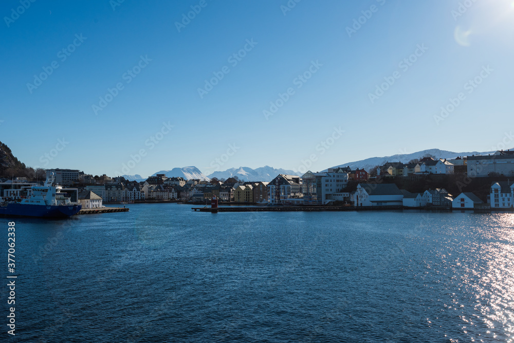 Approaching the city of Ålesund with the post ship on a clear winter day