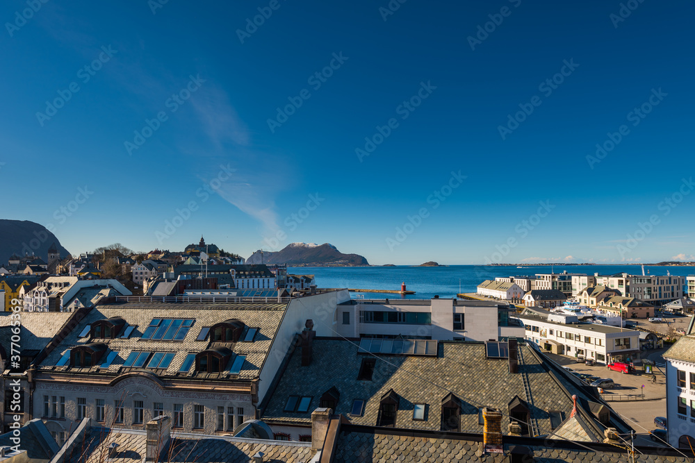 Scenic overview from high angle on the city of Ålesund in Norway on sunny clear winter day
