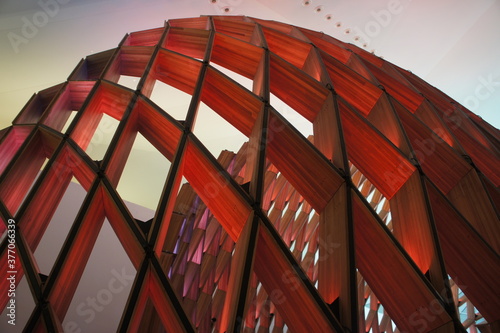 Wooden sculpture bathed in soft light.