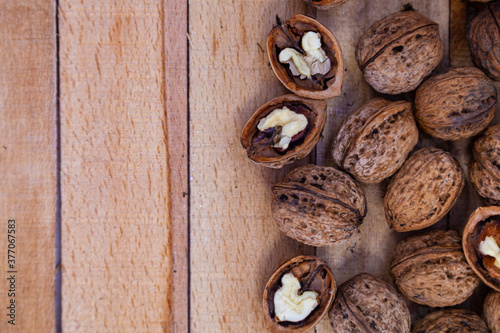 Walnuts on a wooden table.