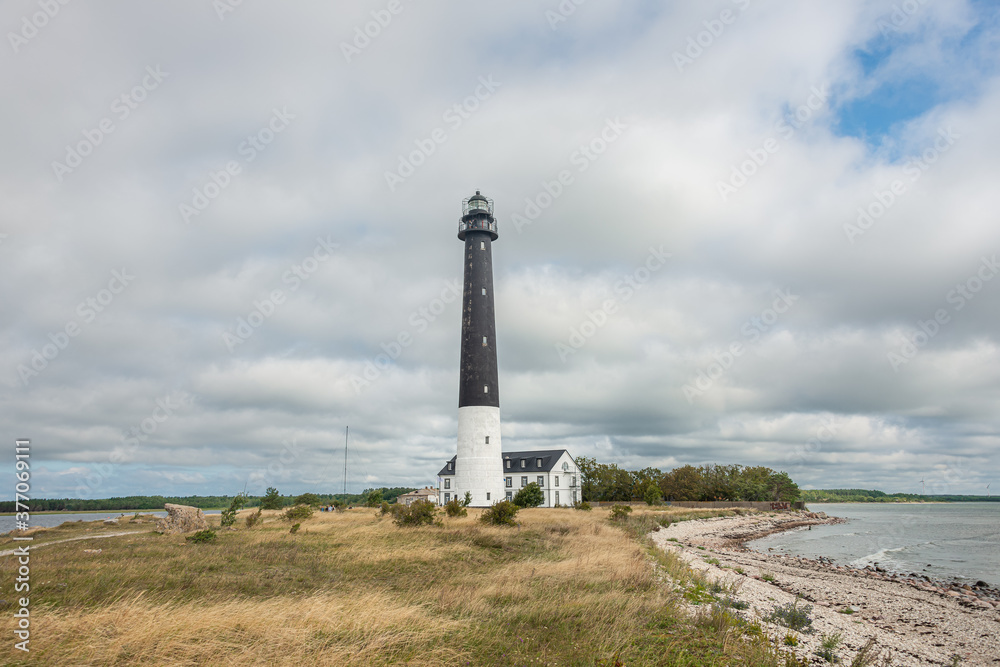 Sightseeing of Saaremaa island. Sõrve lighthouse is a popular landmark and scenic location on the Baltic sea coast