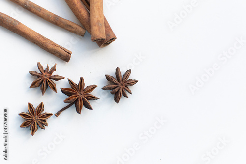 Fototapeta Naklejka Na Ścianę i Meble -  star anise on a white background. this aromatic spice is used for cooking food and various drinks