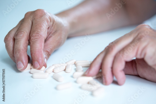 Patient taking pills.