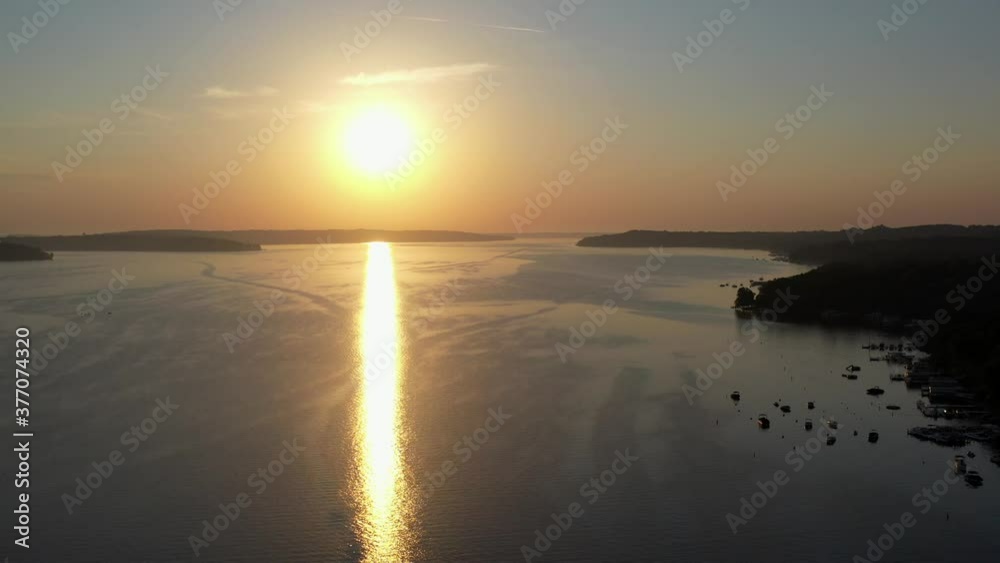 aerial view of the sun setting over Lake Geneva, Wisconsin. aerial view of the sun setting over Lake Geneva, Wisconsin.