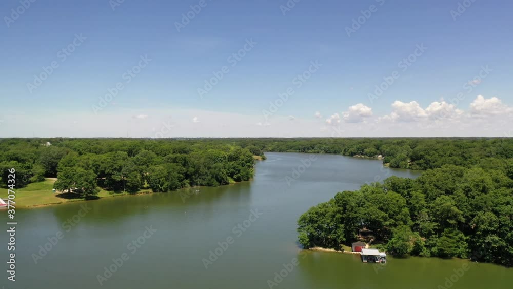 Ascending aerial view of a lake during blue hour. Ascending aerial view of a lake during blue hour.