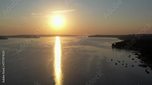 aerial view of the sun setting over Lake Geneva, Wisconsin.