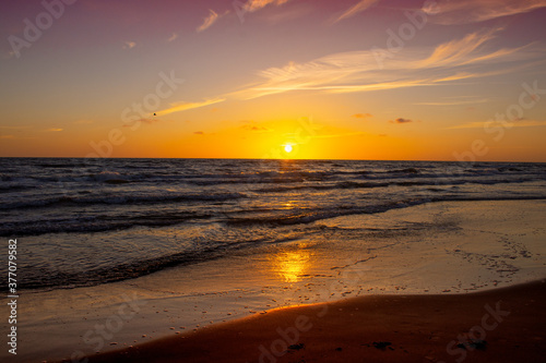 Amazing sunset over the beach on Baltic sea