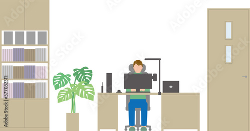 住宅。書斎でパソコン操作する男性