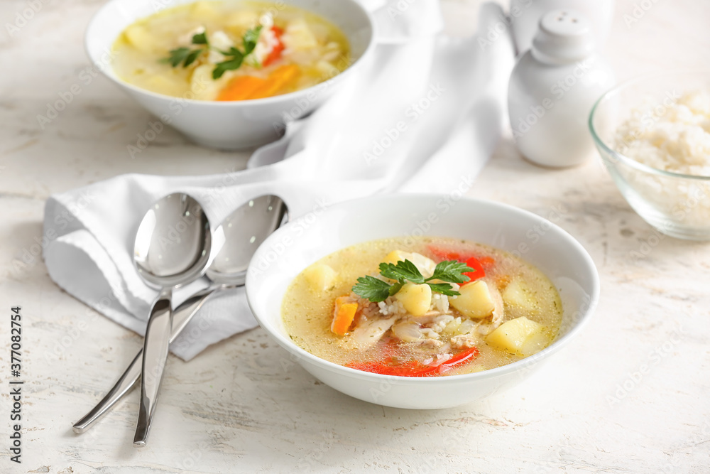 Bowl of tasty rice soup on table Bowl of tasty rice soup on table