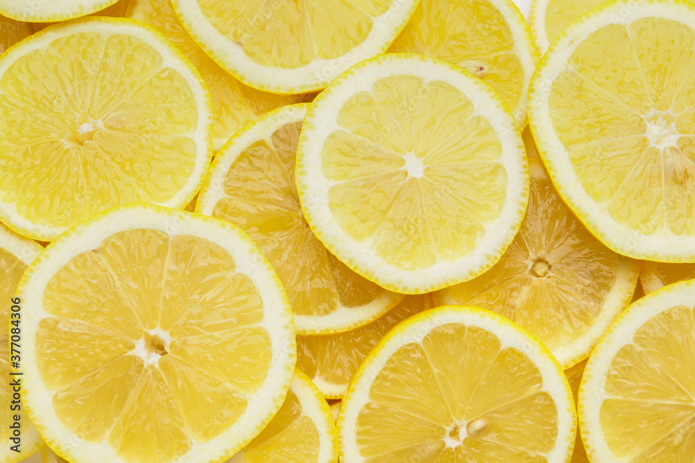Slices of ripe lemon as background Slices of ripe lemon as background