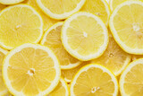 Slices of ripe lemon as background