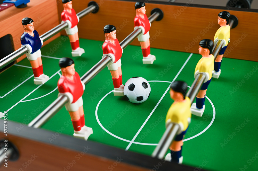 mini football with players and ball, close-up mini football with players and ball, close-up