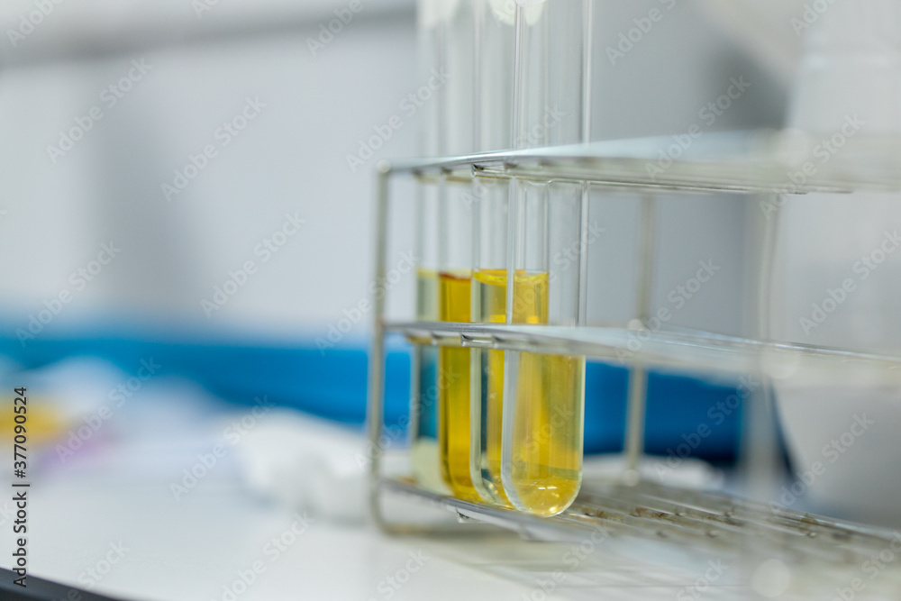 Sample analysis using Spectrophotometer for lab experiments. Stock Photo Adobe Stock