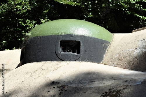 Close view on turret of fortification of Schoenenbourg is part of Maginot Line along the French border with Germany. This historical monument from the World War 2 is local sightseeing attraction. photo