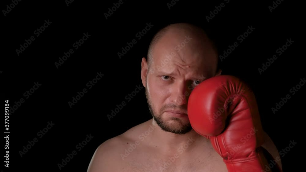frustrated male boxer touches his bruised after a knockout. Defeat, loosing frustrated male boxer touches his bruised after a knockout. Defeat, loosing