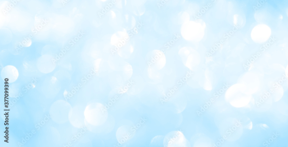 Bokeh light on blue background, sky with circle glitter light blue. Snow abstract soft glowing with vivid bright light and bokeh blur effect.  - obrazy, fototapety, plakaty 