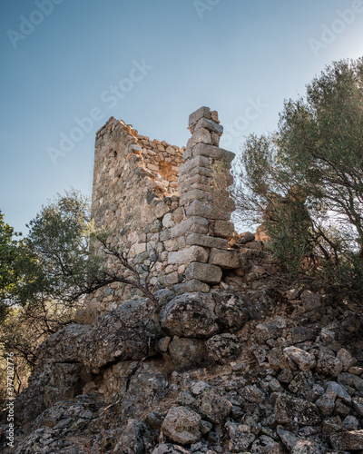 Ruins of 15th century fortified tower in Corsica photo