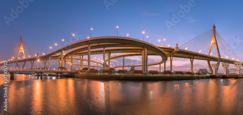 Motorway, Expressway, Freeway the infrastructure for transportation in modern city, urban view at twilight time..