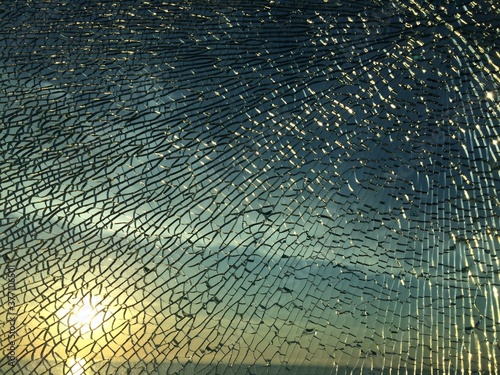 broken glass at sunset. background