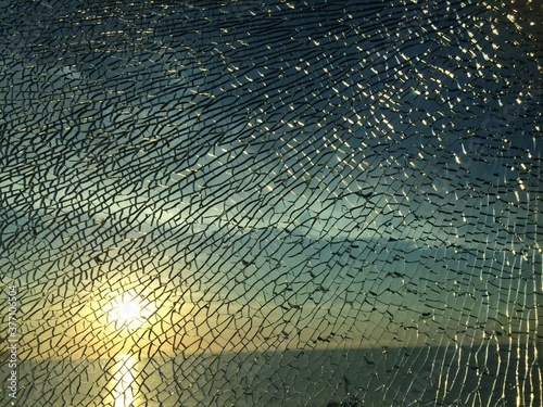 broken glass at sunset. background