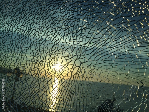 broken glass at sunset. background