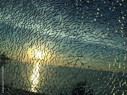 broken glass at sunset. background