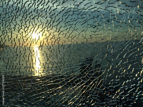 broken glass at sunset. background