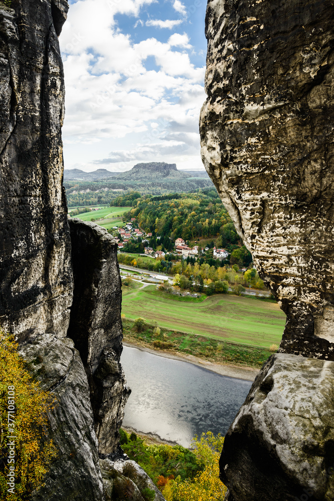 Rathen and Elbe river from Bastei bridge and Sandstone mountains