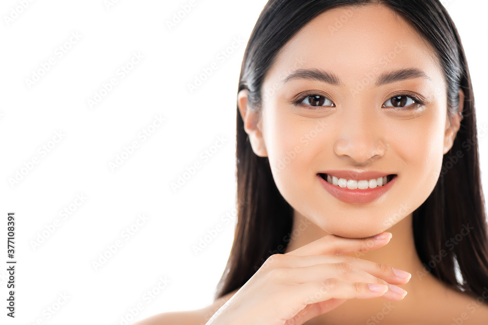 Portrait of excited young asian woman looking at camera and touching face isolated on white Portrait of excited young asian woman looking at camera and touching face isolated on white