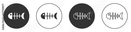 Black Fish skeleton icon isolated on white background. Fish bone sign. Circle button. Vector.
