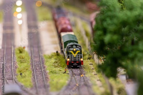 A model of a train maneuvers on a railway siding