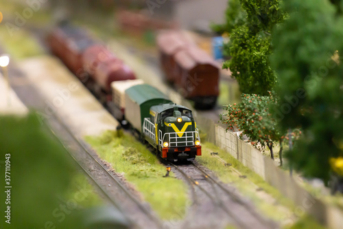 A model of a train maneuvers on a railway siding