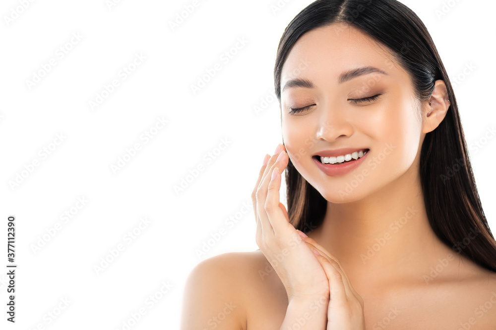 Excited young asian woman with closed eyes touching face isolated on white Excited young asian woman with closed eyes touching face isolated on white